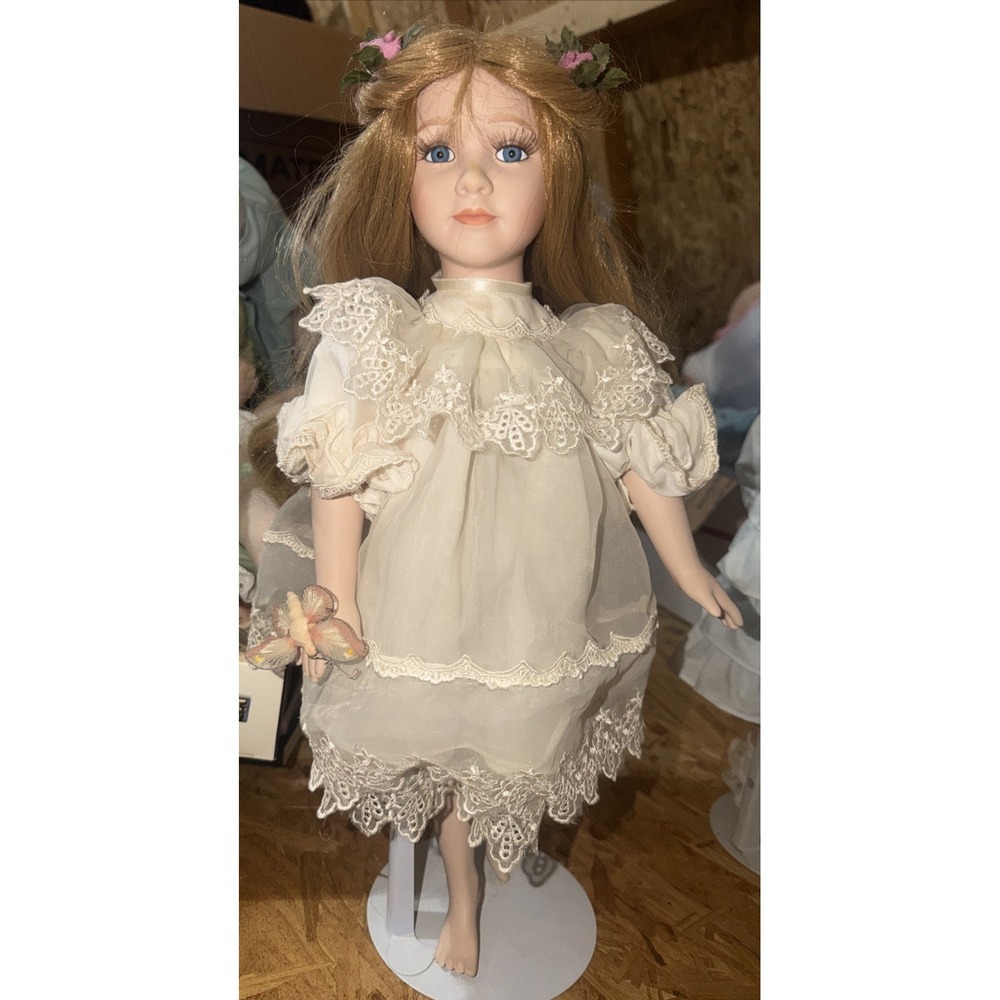 Vintage Dynasty doll collection porcelain doll On Stand W/ Blue Eyes Flowers EUC